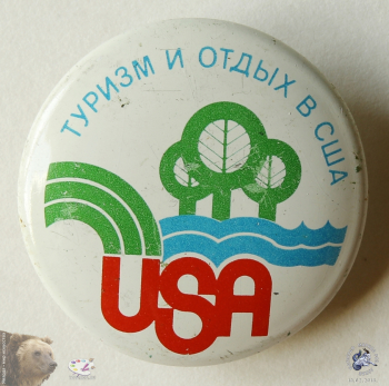 Значок `Туризм и отдых в США`. Выставка в СССР