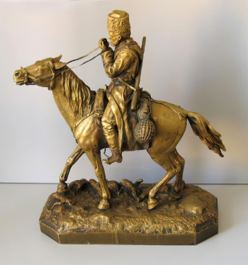 Самонов Пётр Александрович. Казак, раскуривающий трубку. Бронза. 45х19х40. Государственный мемориальный музей А.В.Суворова.